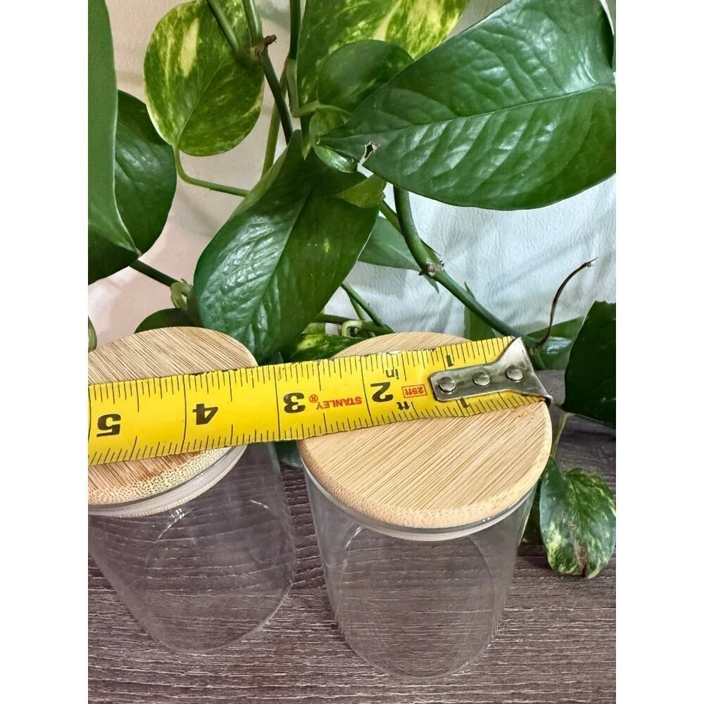 Two wooden sealed jars